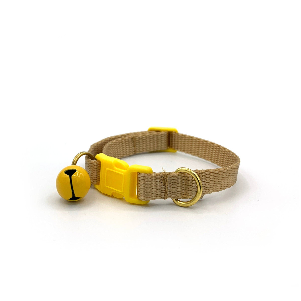 Tan nylon cat collar with a yellow buckle and yellow bell