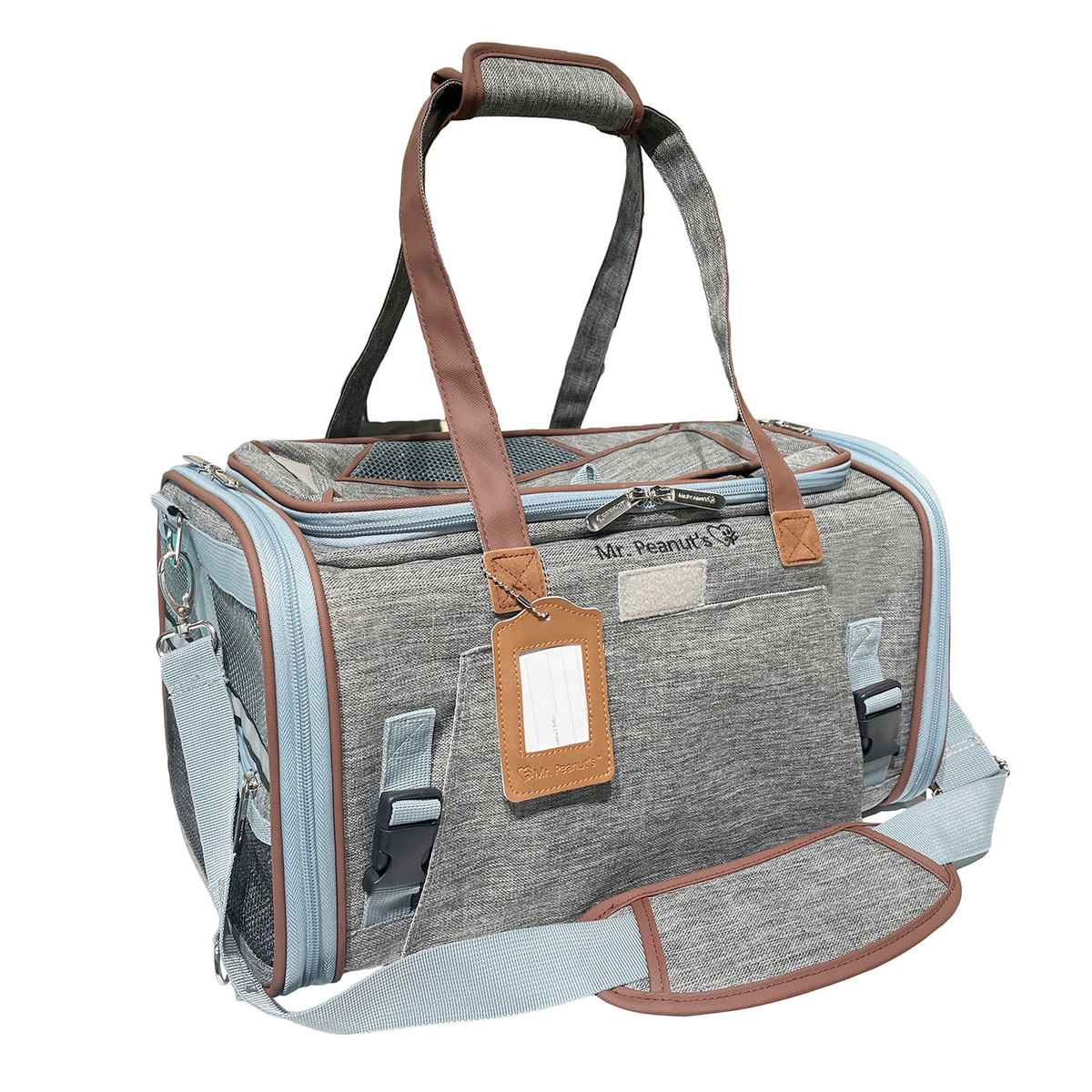 Gray Gold Series Mini carrier with brown handles, a luggage tag and the padded shoulder strap attached