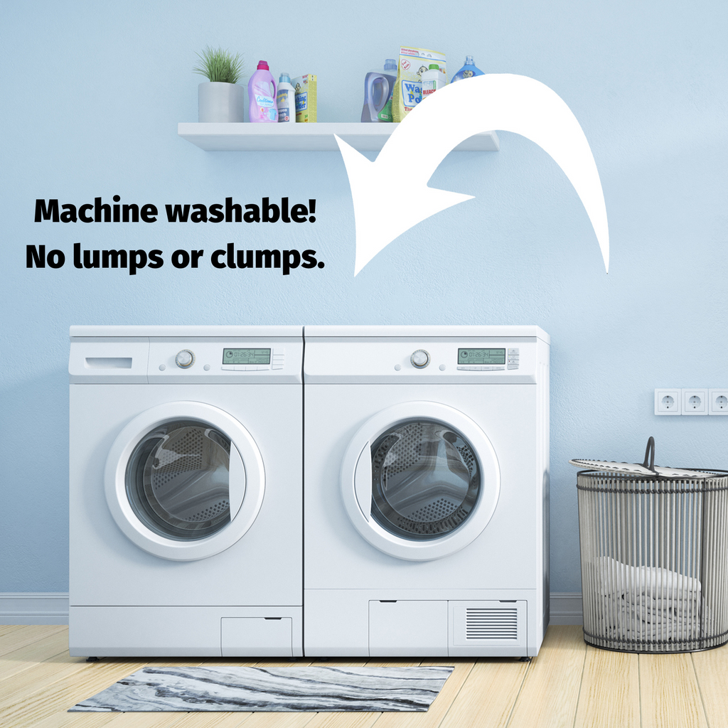 Two washing machines with an arrow pointing to them