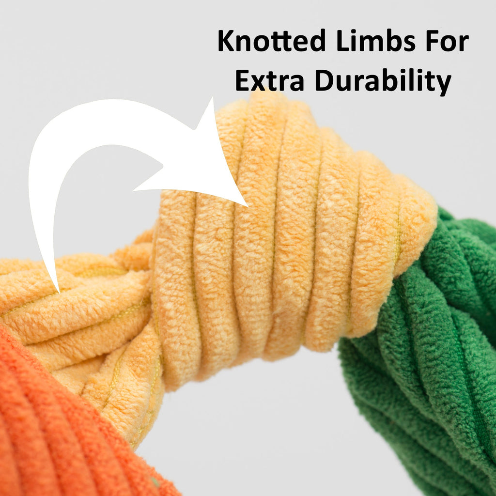 Close-up of a knotted corduroy toy limb in orange, yellow and green