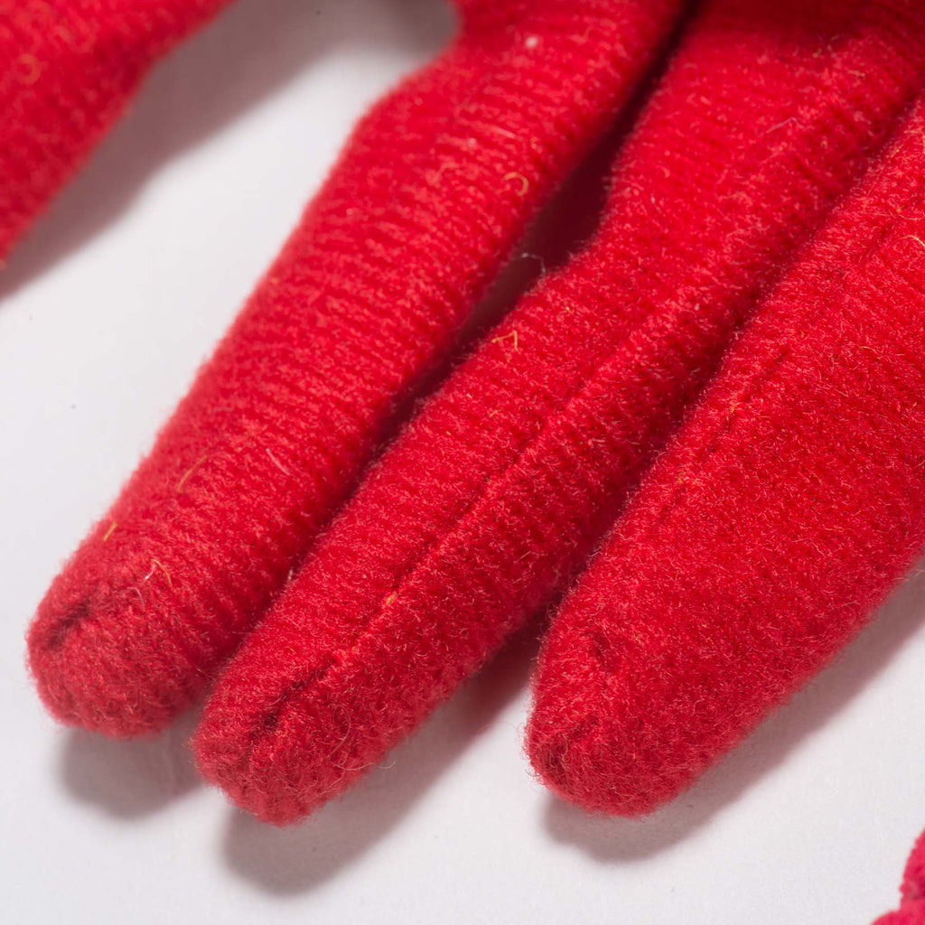 Close-up of the lobster toy's red corduroy legs