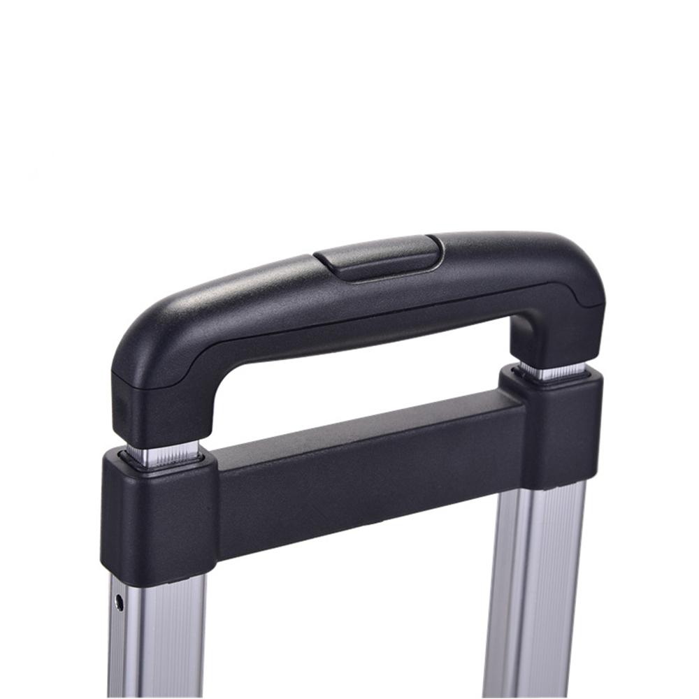 Close view of the spinner wheelbase's black pull-up handle grip