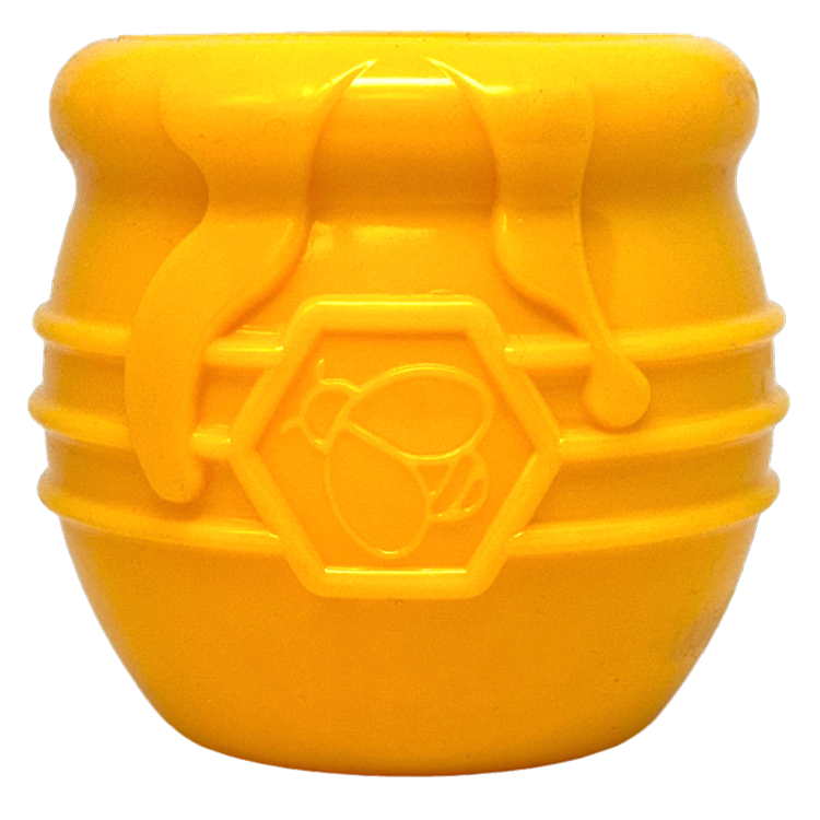 Yellow rubber honey pot treat toy with a bee emblem