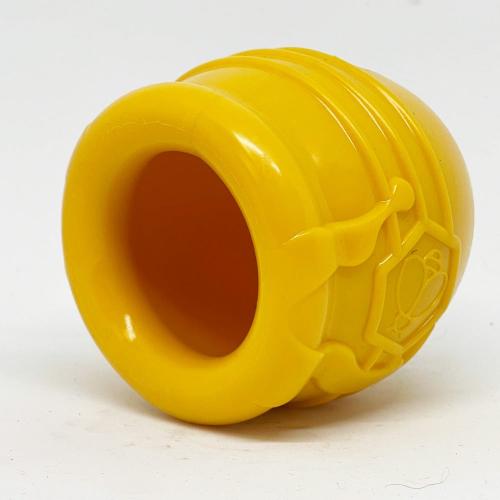 Yellow honey pot toy seen at an angle, showing the opening