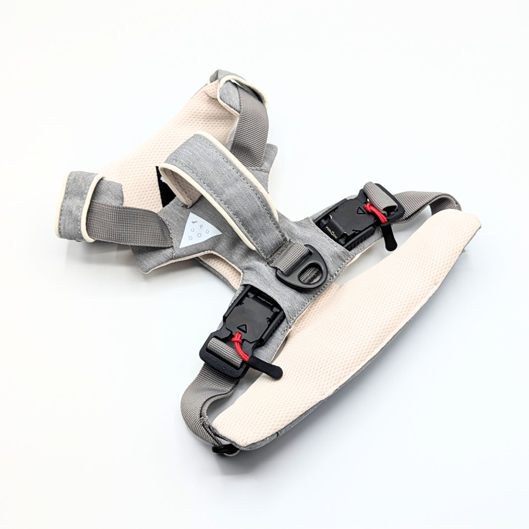 Gray and cream dog harness shown at an angle