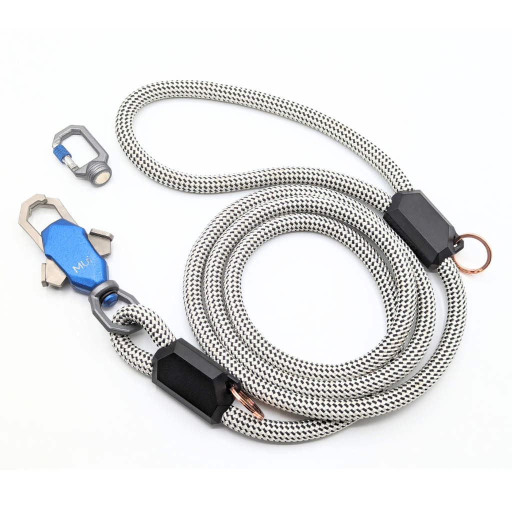 Gray rope leash coiled with its magnetic latch and clip