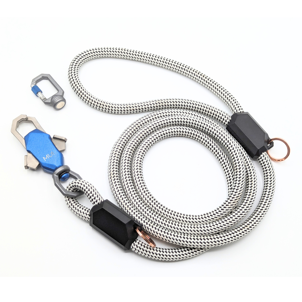 Gray rope leash coiled with its magnetic latch and clip
