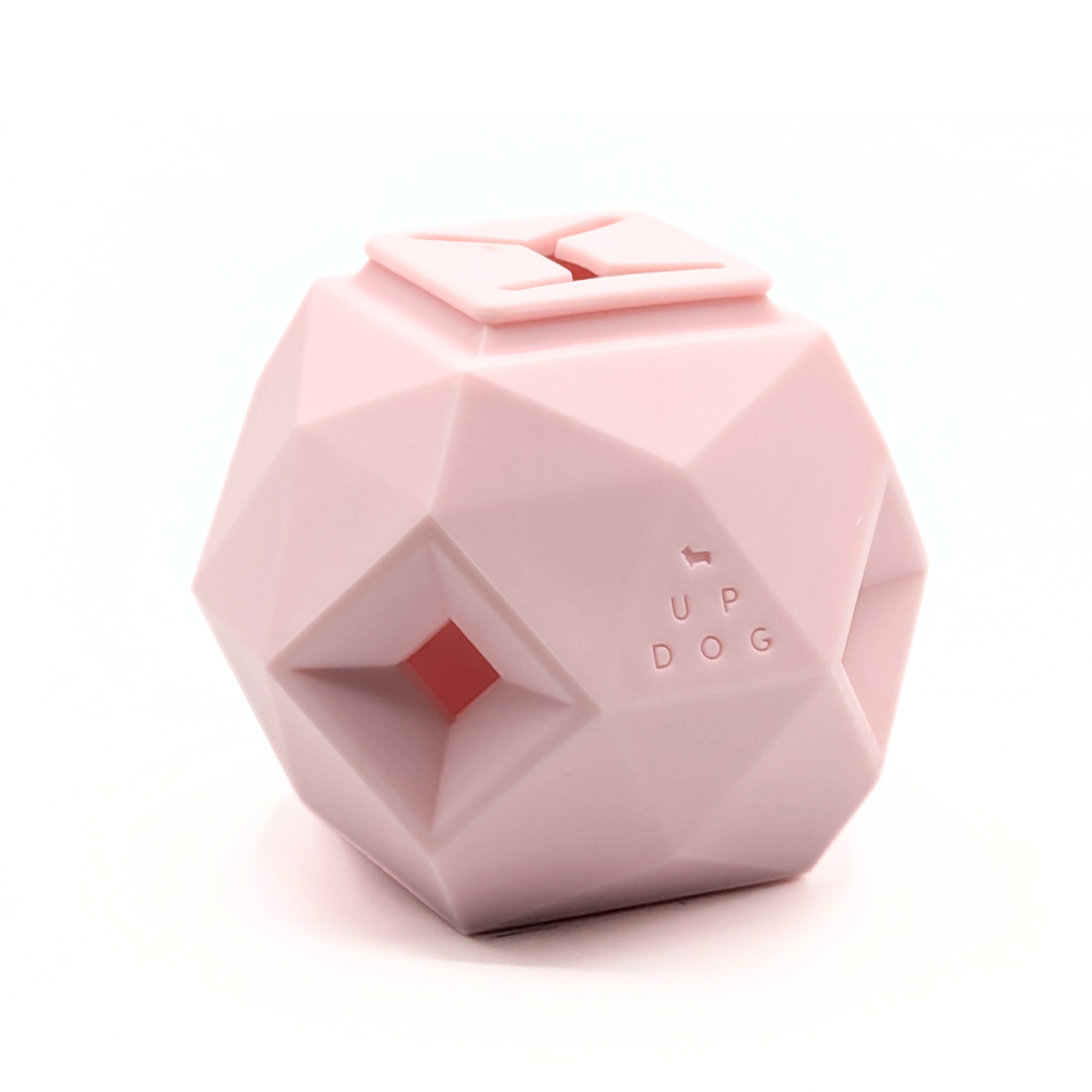 Pink geometric treat dispensing dog toy
