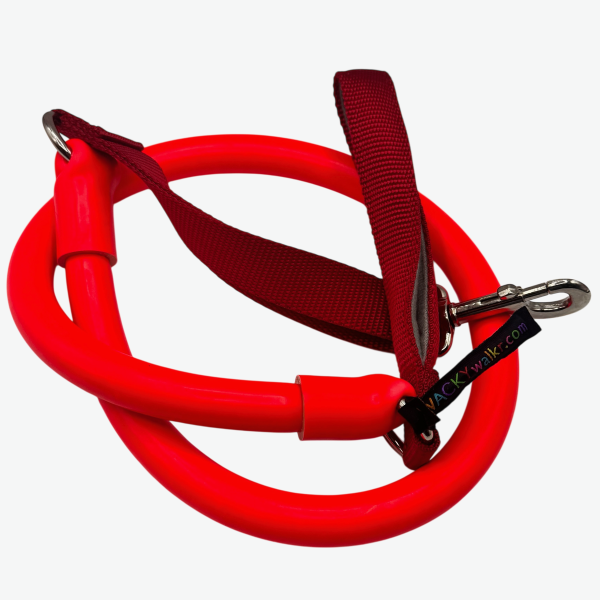 Red coiled stretch dog leash with a dark red handle