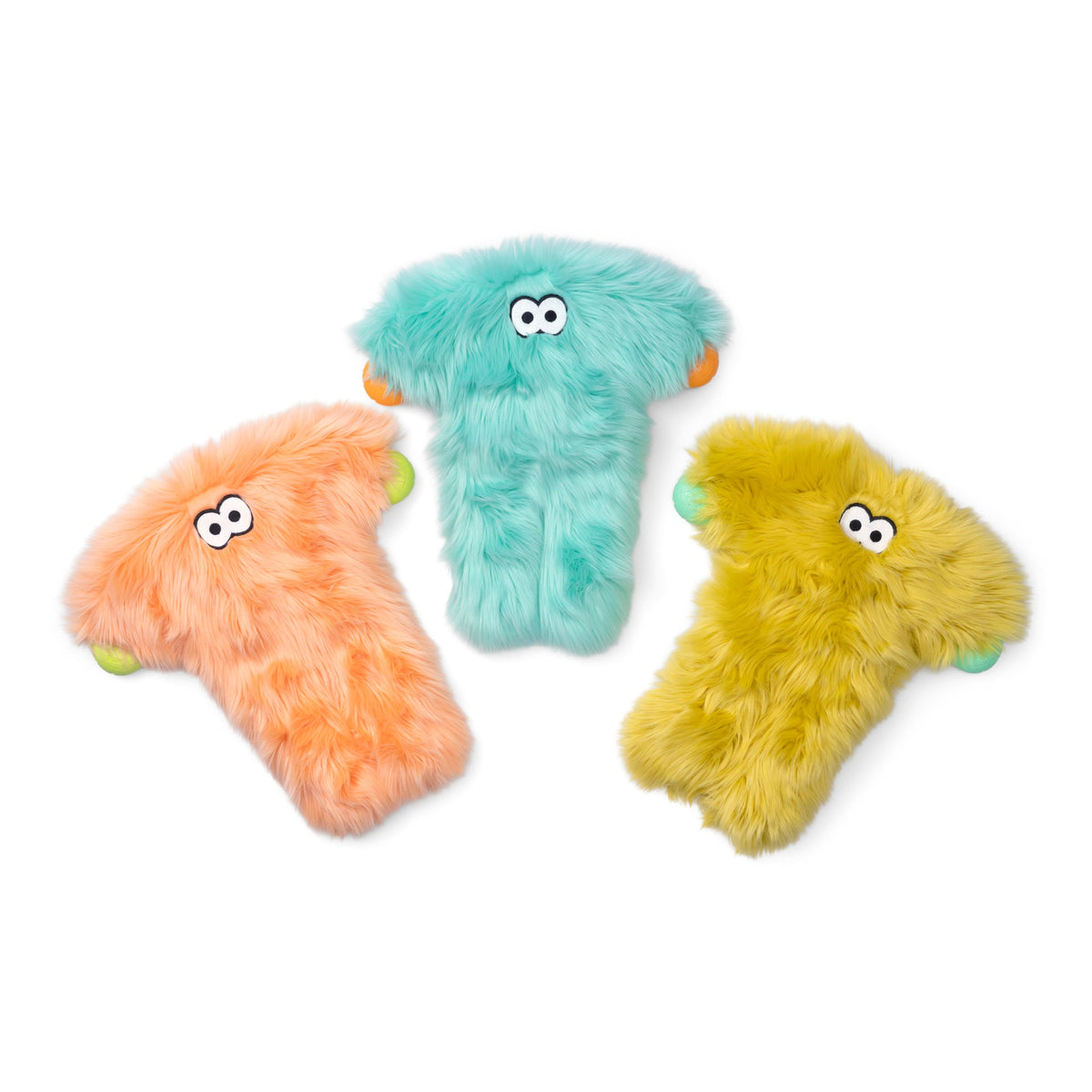 Three long-legged shaggy plush dog toys in peach, mint and olive