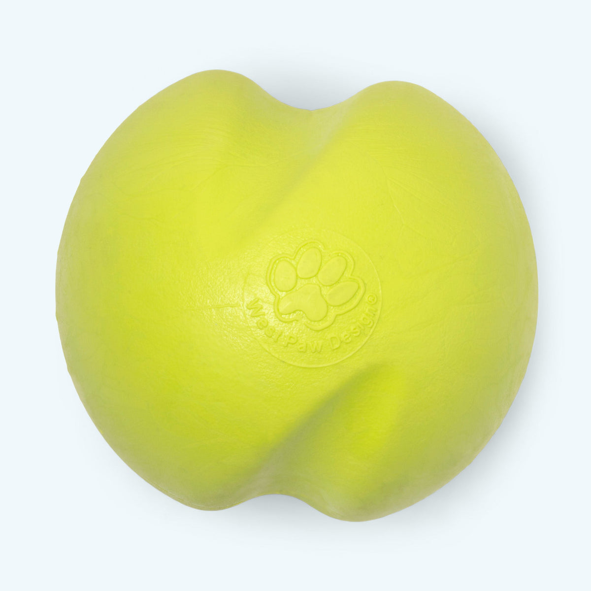 Lime bouncy rubber ball dog toy, close-up