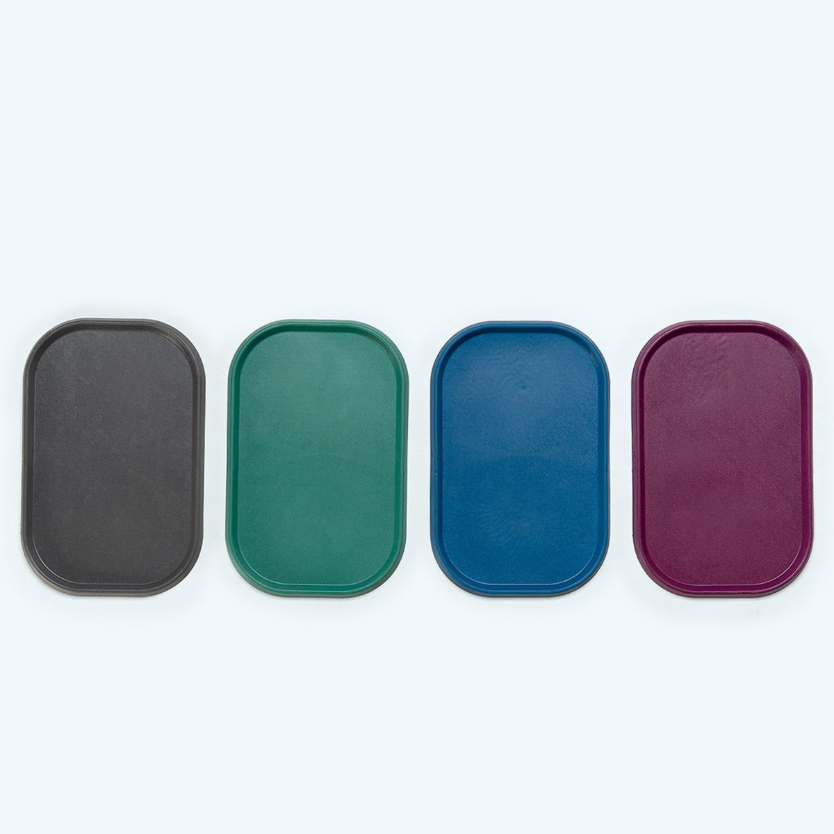 Feeding placemats in charcoal, green, blue and plum