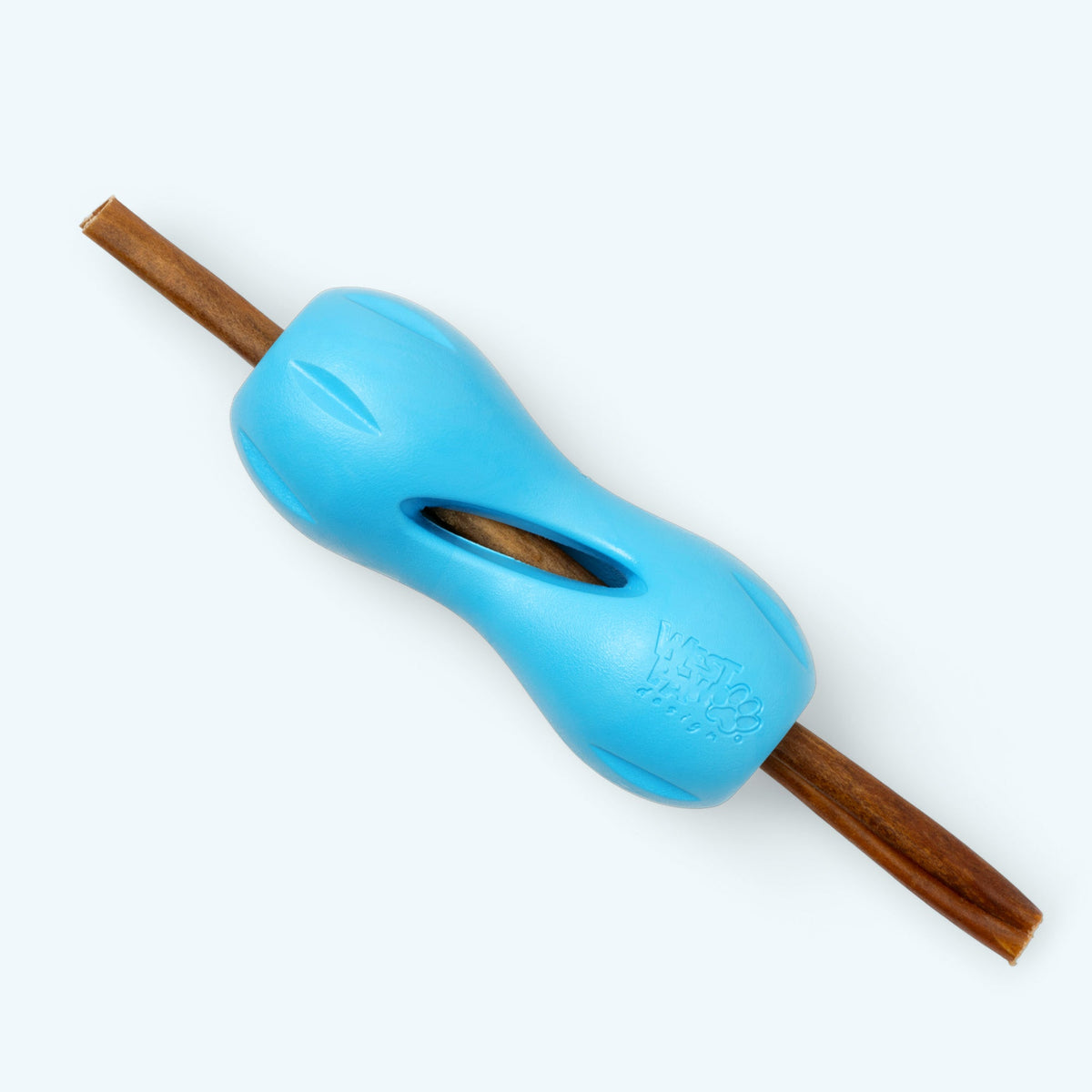 Blue hourglass treat toy with a chew stick pushed through it