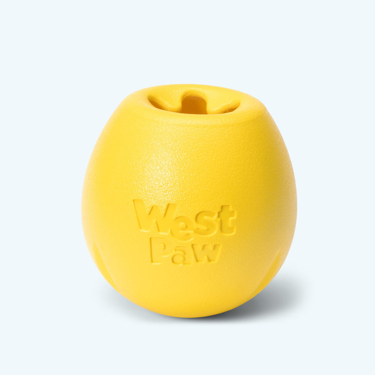 Small yellow egg-shaped rubber treat toy