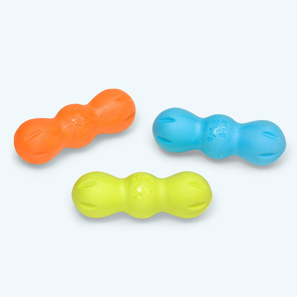 Three-lobed rubber chew toys in orange, blue and lime