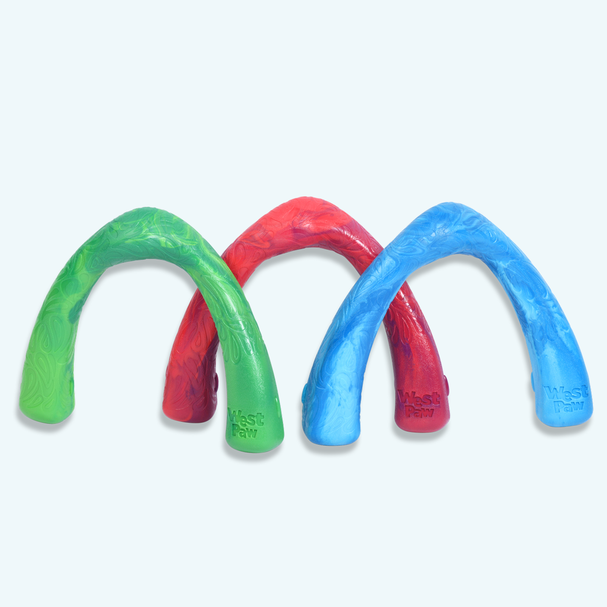 Arch-shaped rubber tug toys in green, red and blue