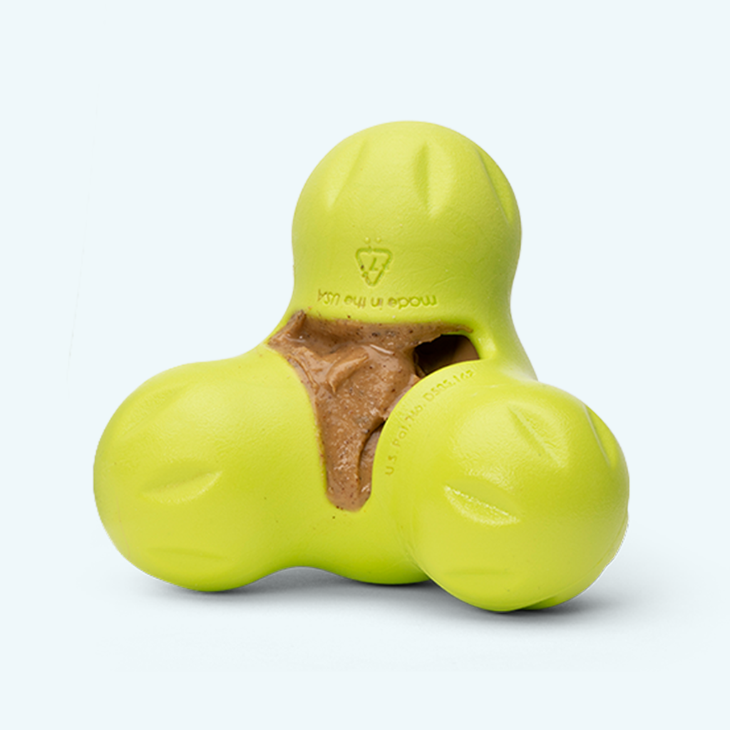 Lime three-lobed rubber treat toy with a treat tucked inside