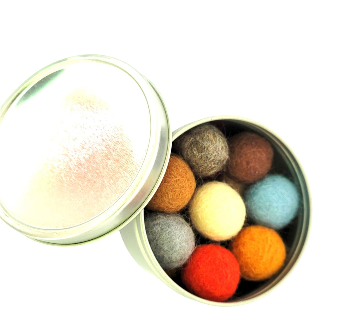 Open tin of felted wool cat balls in mixed colors